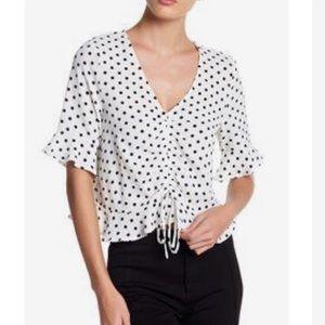 White polka dot top